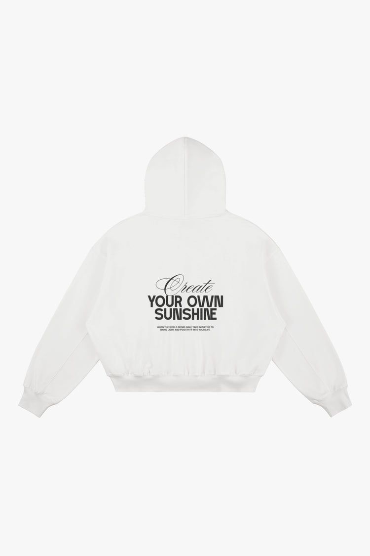 sudadera con capucha blanca con arte "Create your own sunshine" en purpurina negra