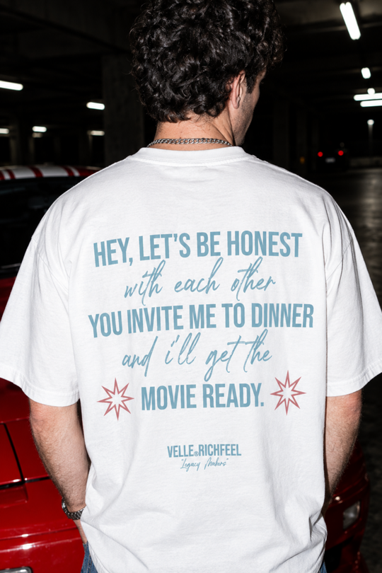 camiseta unissexo de corte boxy com arte "BE HONEST"