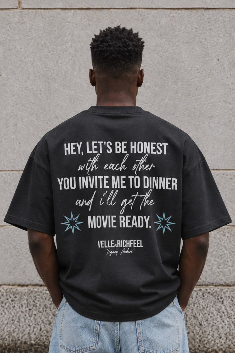Unisex boxy-fit T-shirt with white “BE HONEST” artwork